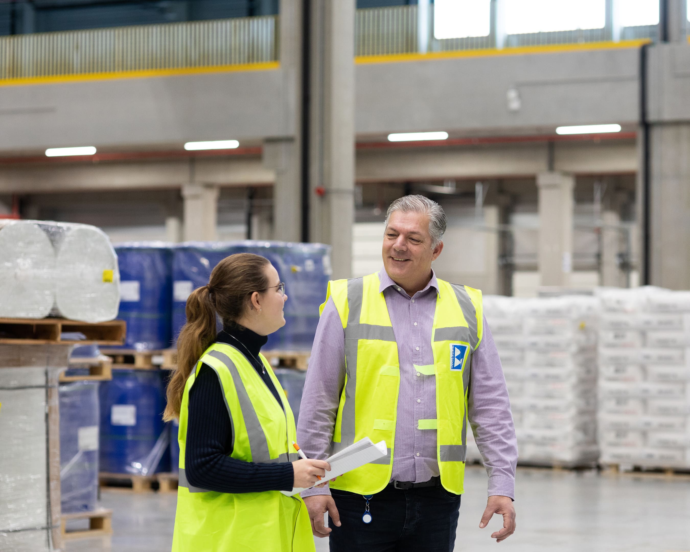 Logistics Management student and teacher laughing together