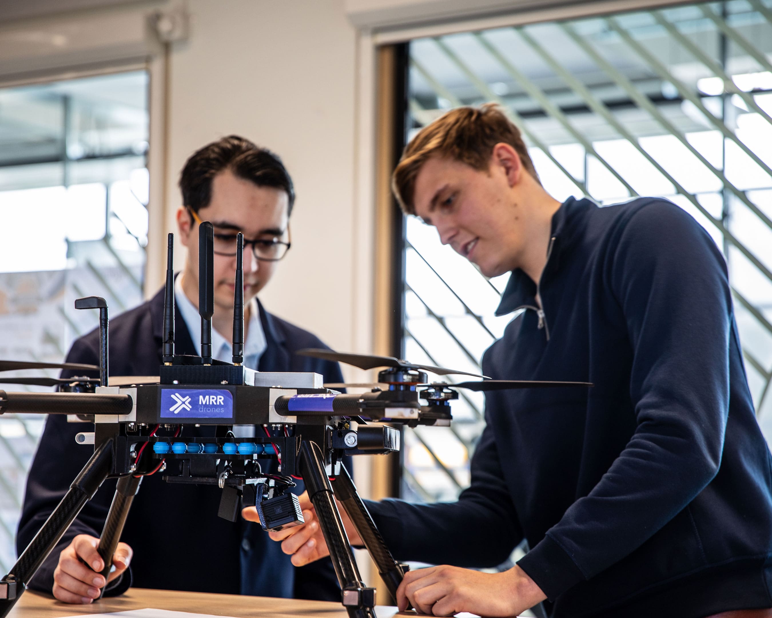 Master Applied IT students working on a drone