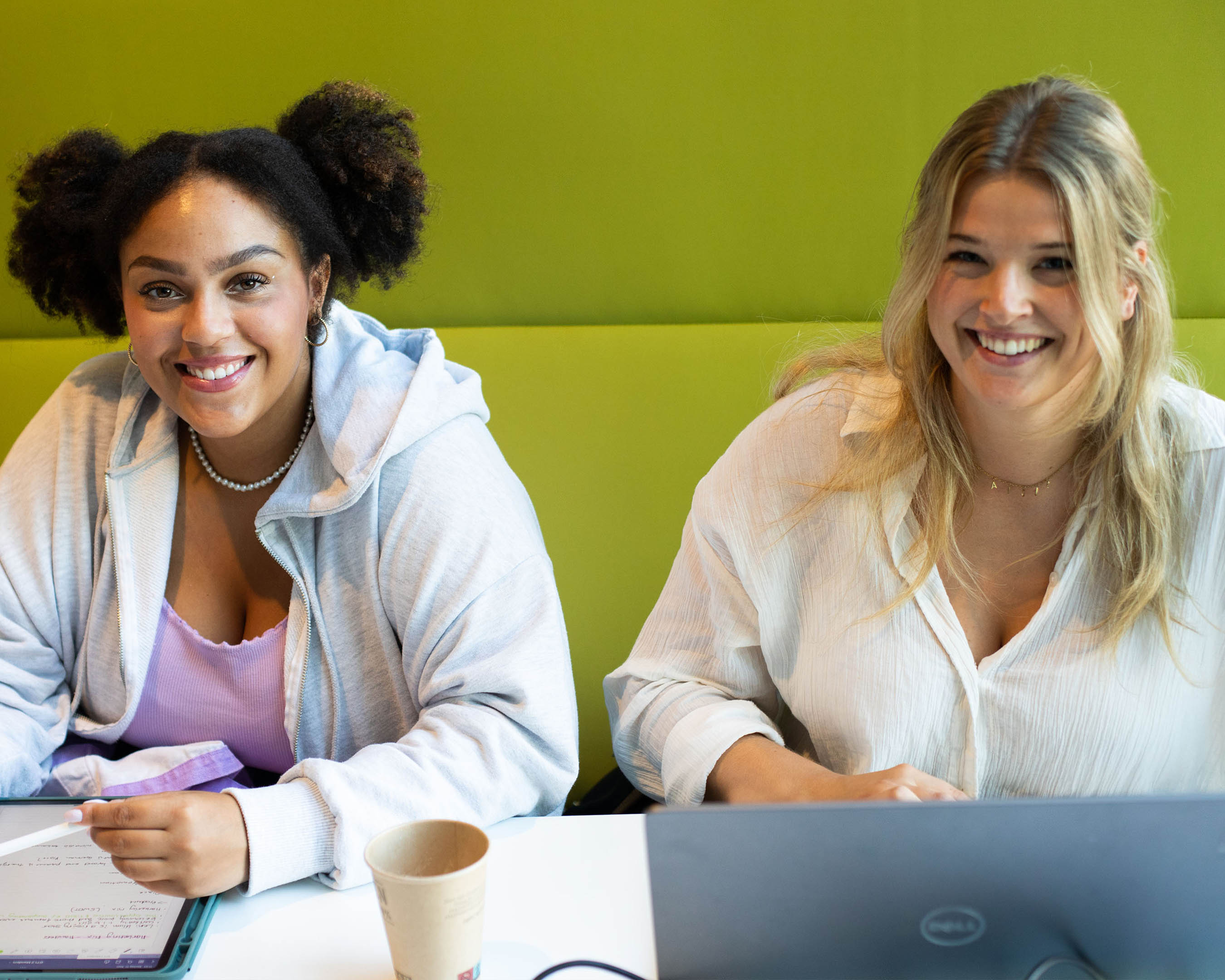 Students working behind a laptop 