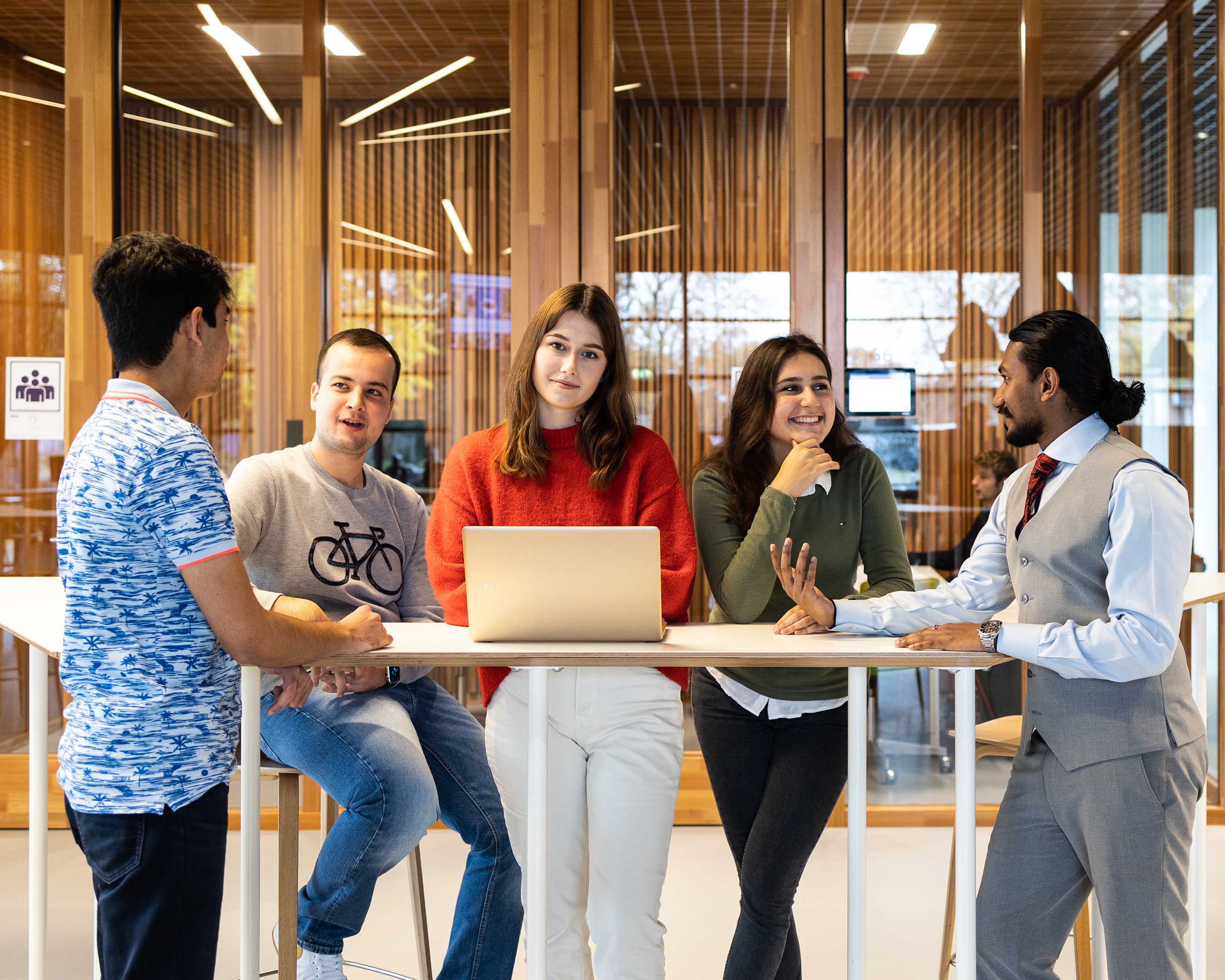 Students chatting around a table