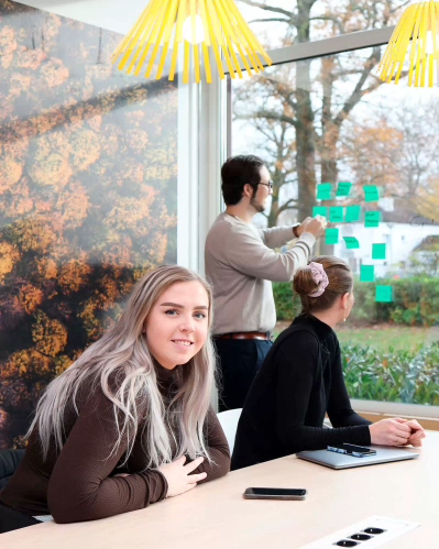 Three students working together